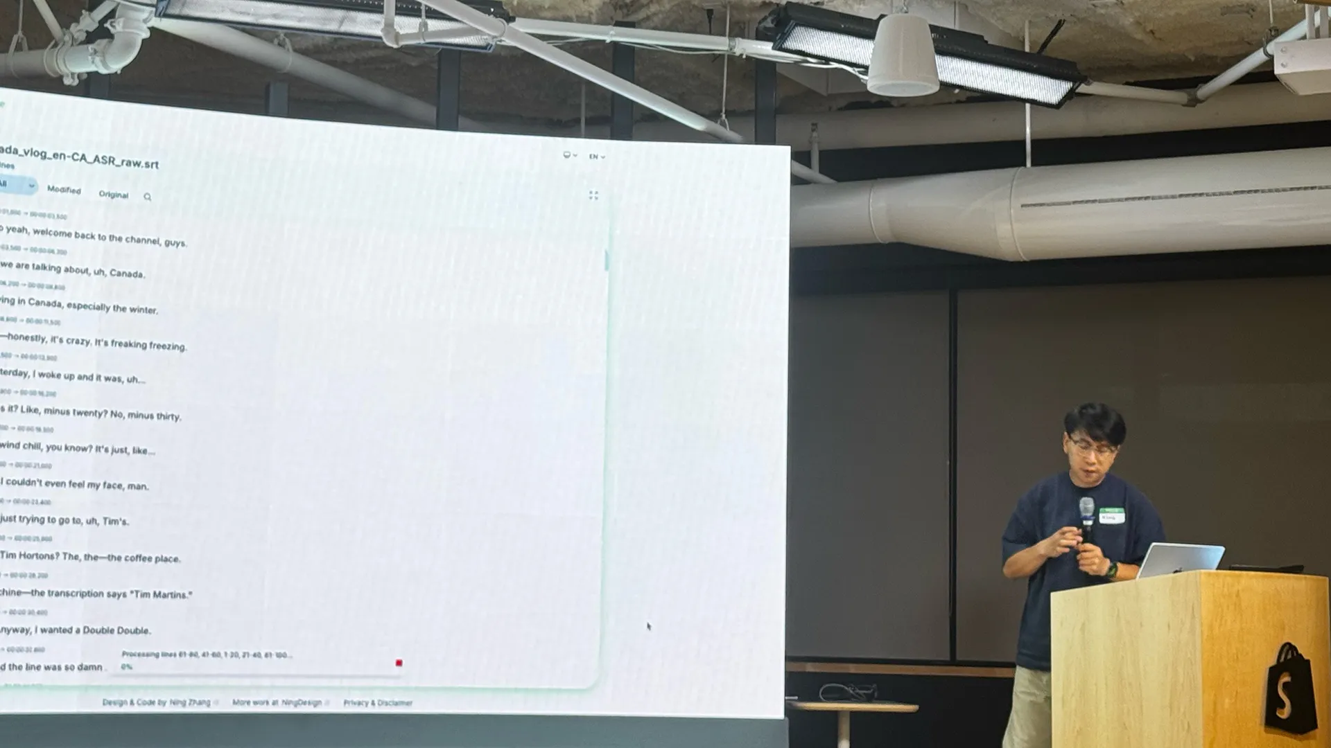 Me at the same lectern, presenting SubLime Captions; the screen shows a subtitle file being processed.